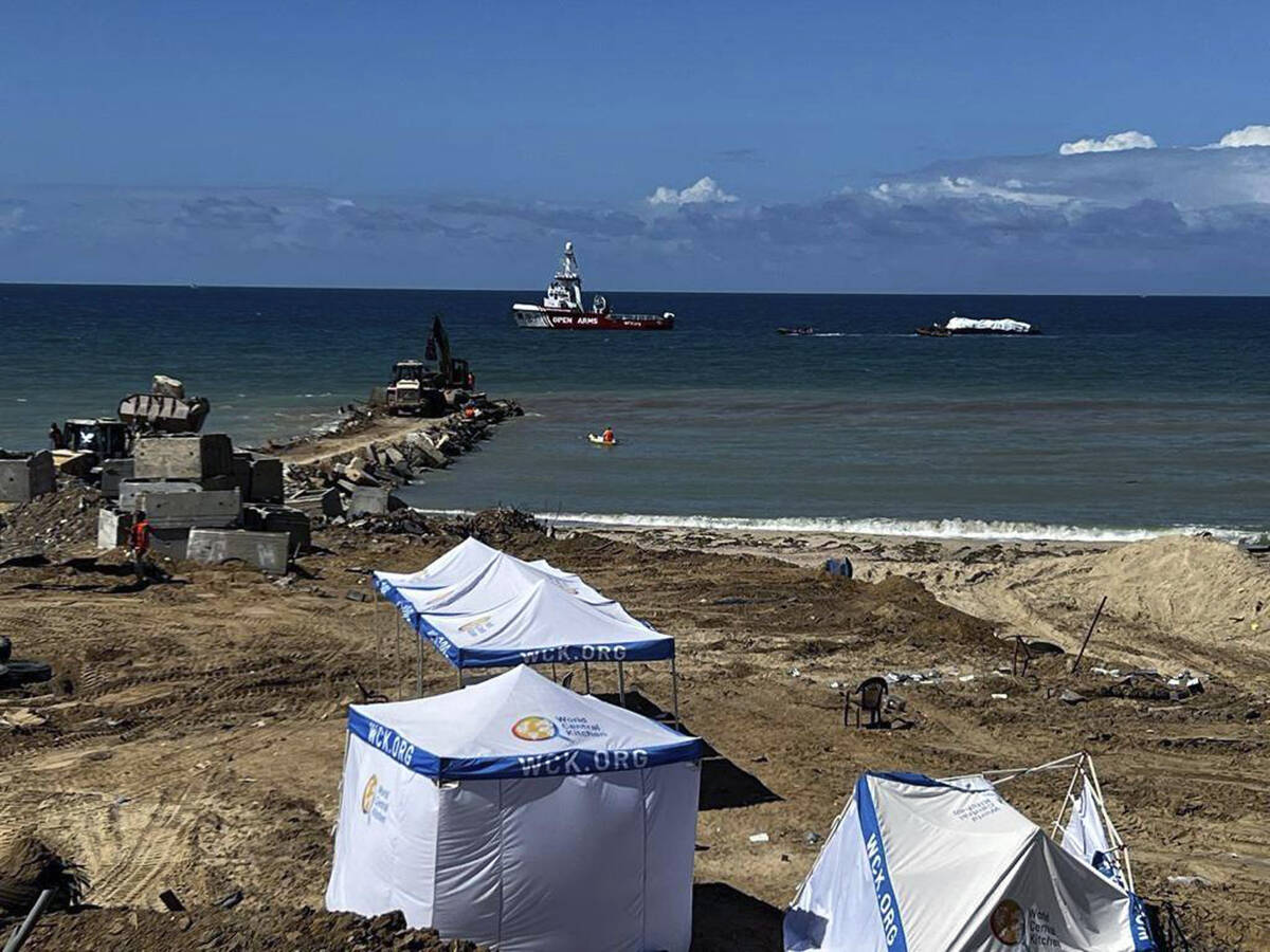 In this photo provided by the Israeli Army, a ship transporting humanitarian aid from the World ...