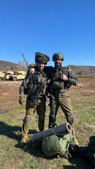 Yuval Perry, left, and his brother-in-law Benji Diechter in a photo taken in December 2023. (Ph ...