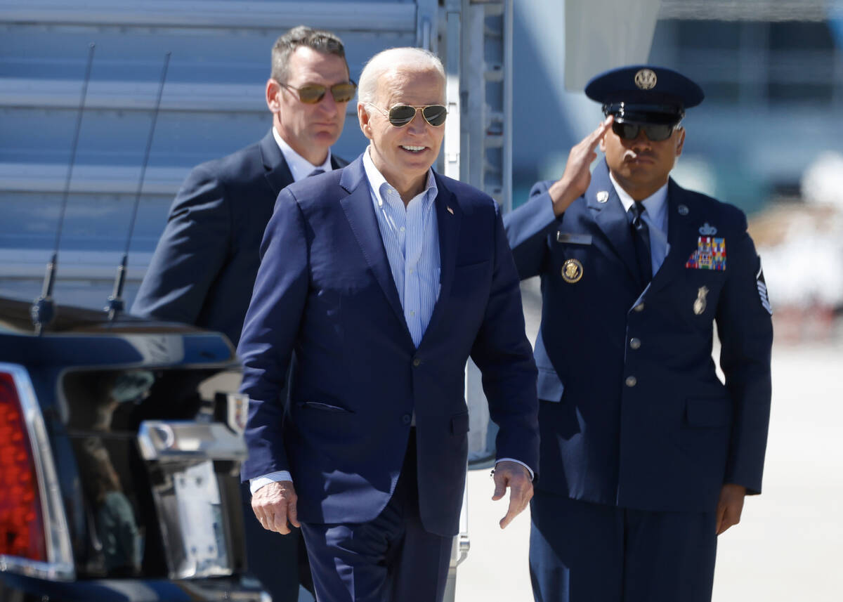 President Joe Biden arrives at Harry Reid International Airport, on Tuesday, March 19, 2024, in ...