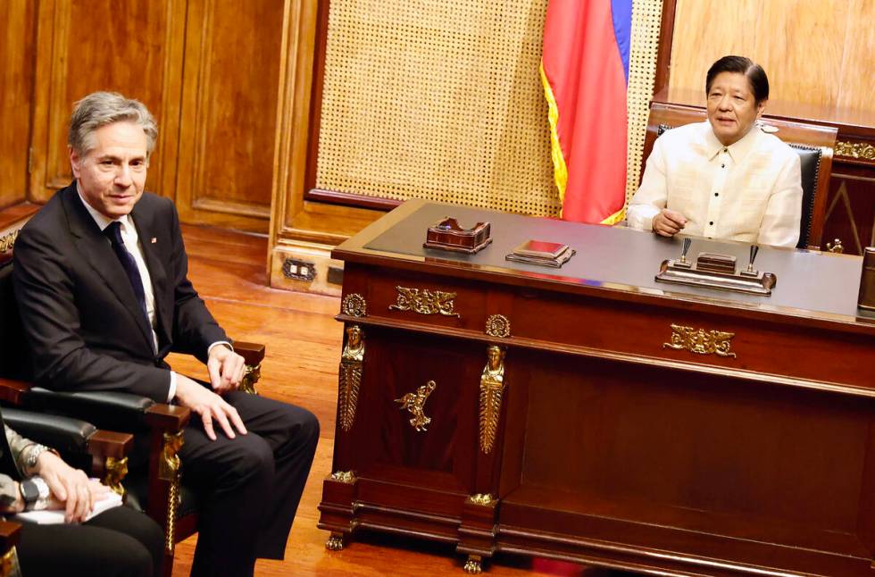 U.S. Secretary of State Antony Blinken (left) meets with Philippine President Ferdinand Marcos ...