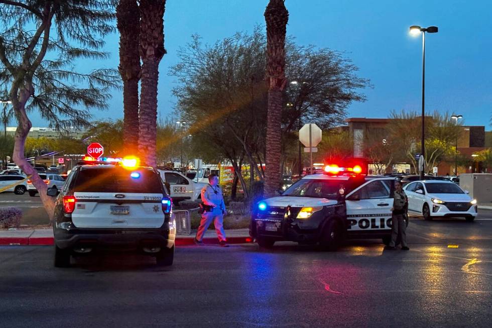 Police investigate a fatal shooting scene near Walmart at 7200 block of Arroyo Crossing Parkway ...