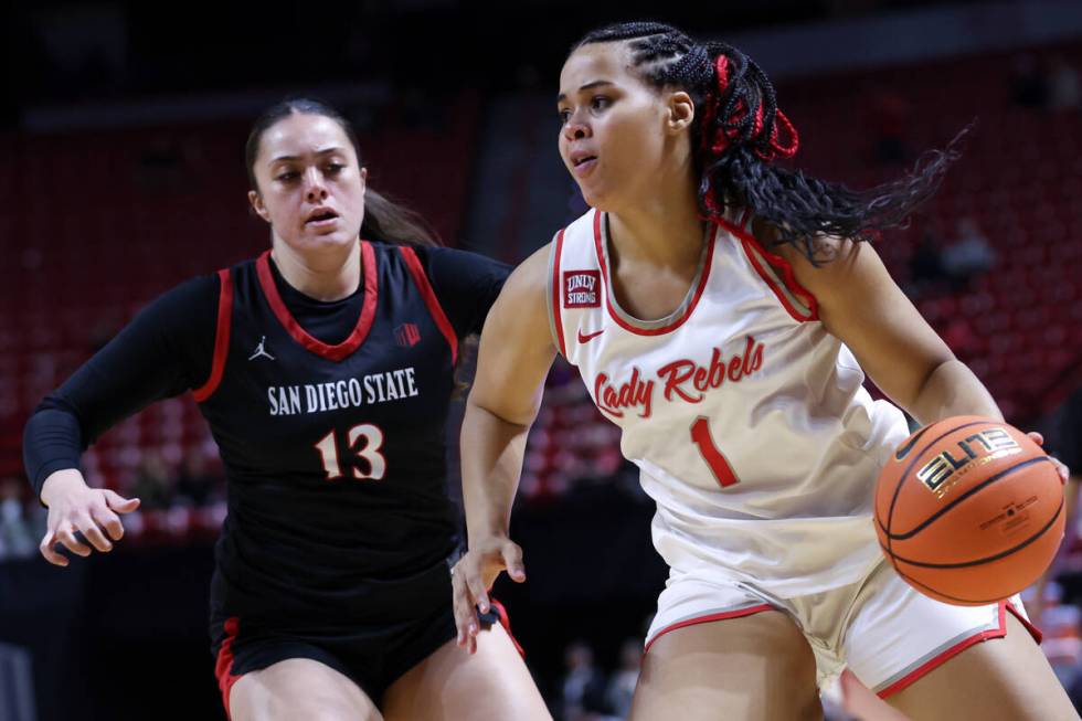 UNLV Lady Rebels forward Nneka Obiazor (1) drives toward the hoop against San Diego State Aztec ...