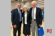 Terry Mannion, center, with her husband Jack Mannion, right, and Mannion Middle School Principa ...