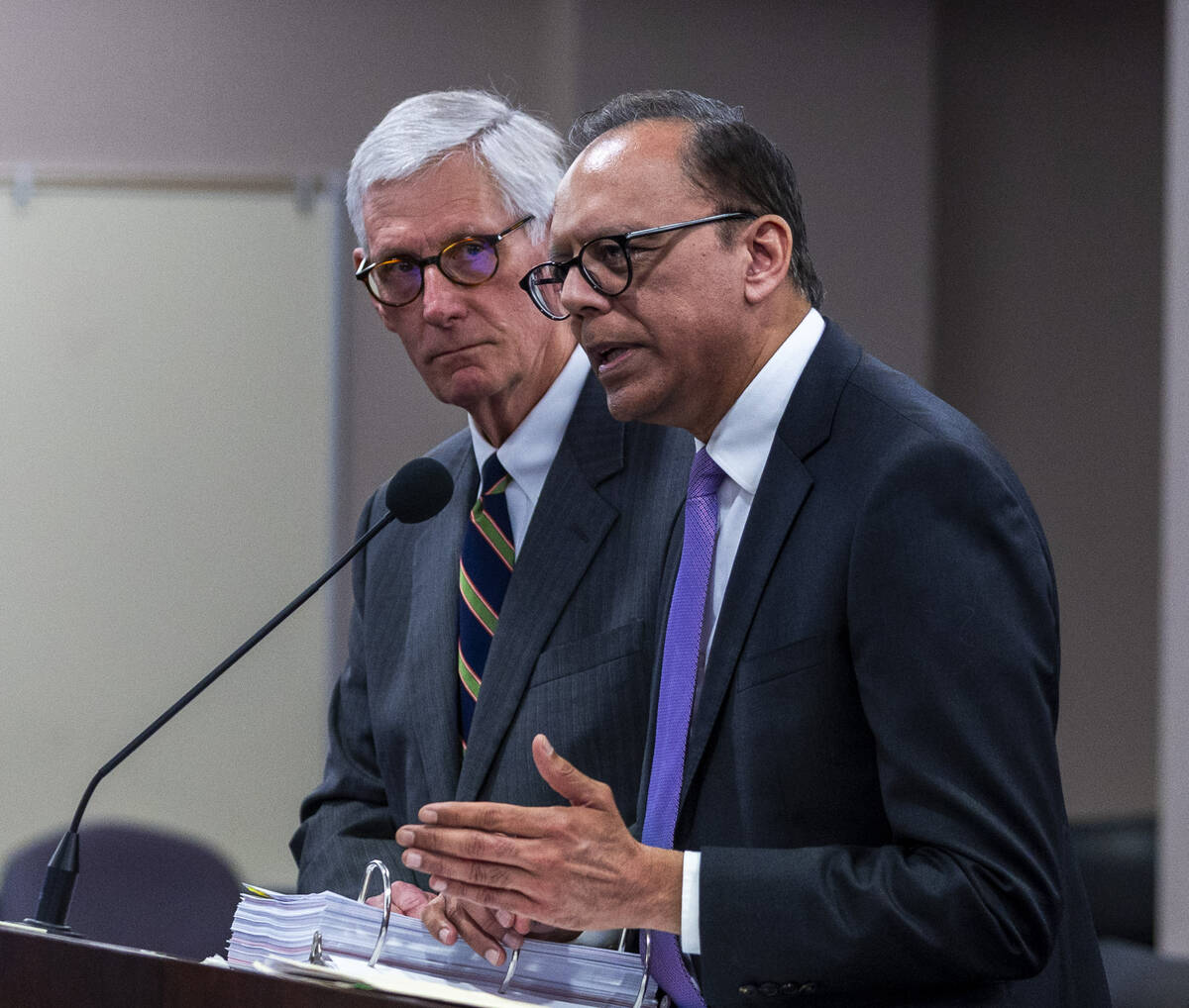 Bally's Corporation Senior VP Ameet Patel, right, with lawyer Dan Reaser speaks at the podium a ...