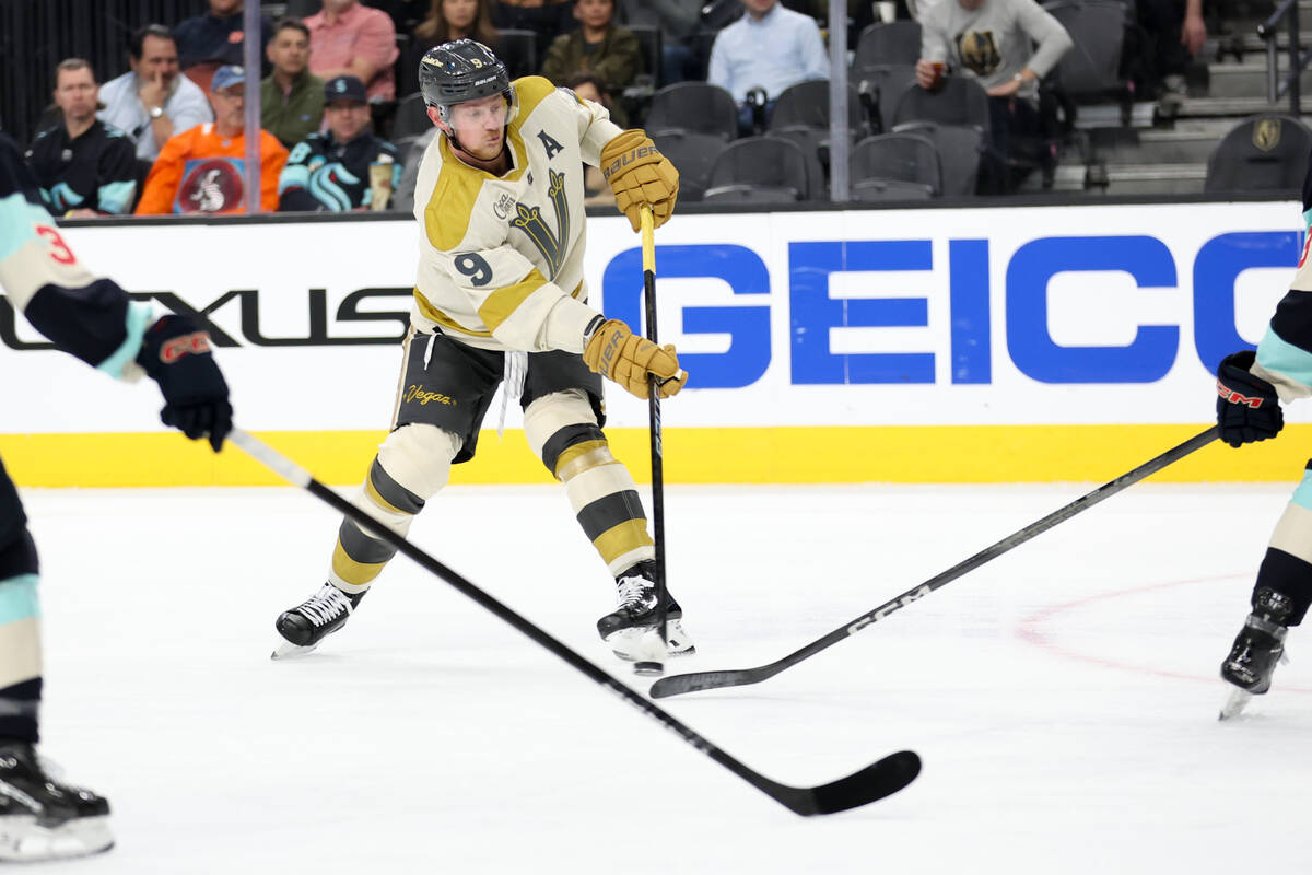 Golden Knights center Jack Eichel (9) whips the puck up the ice during the first period of an N ...