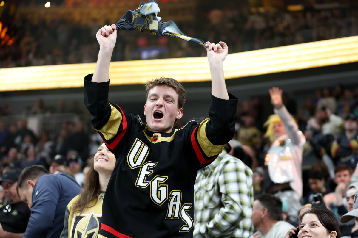 A Vegas fan cheers for the Golden Knights an NHL hockey game against the Kraken at T-Mobile Are ...