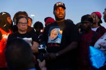 Raymond Heath speaks during a vigil in memory of his son, Devin Heath, who died after being hit ...