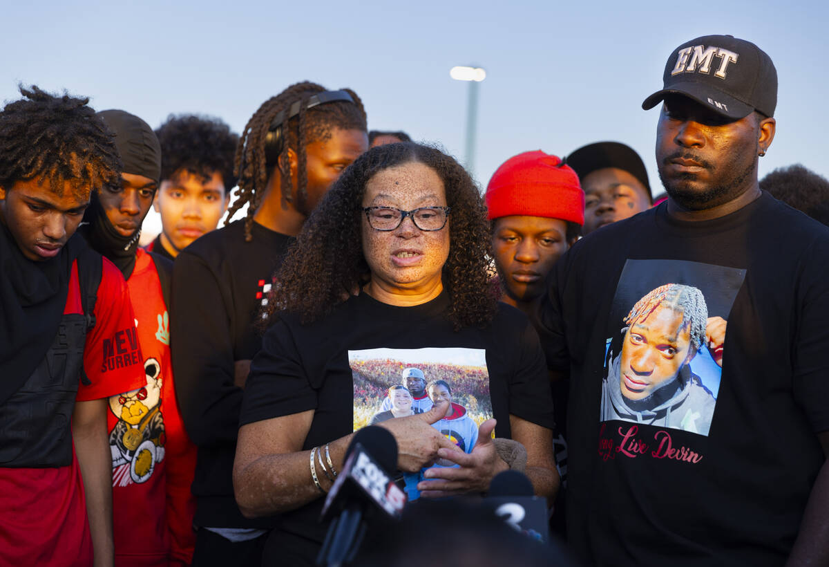 Martina Suyat speaks during a vigil in memory of her son, Devin Heath, who died after being hit ...