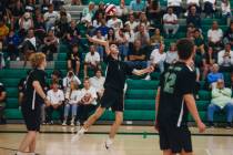 Palo Verde outside hitter Bridger McCoy (11) hits the ball over the net during a game against F ...