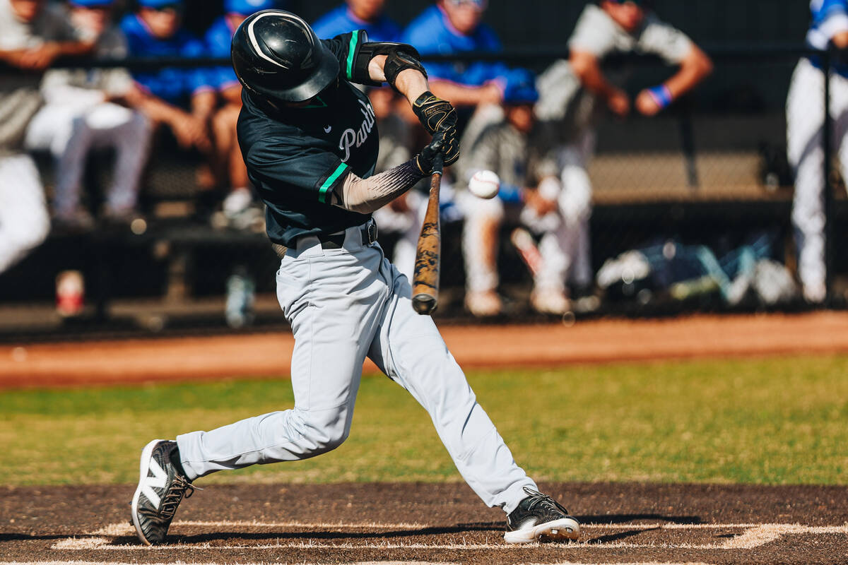 Palo Verde catcher Connor Rosinski (5) hits the ball during a baseball game between Palo Verde ...
