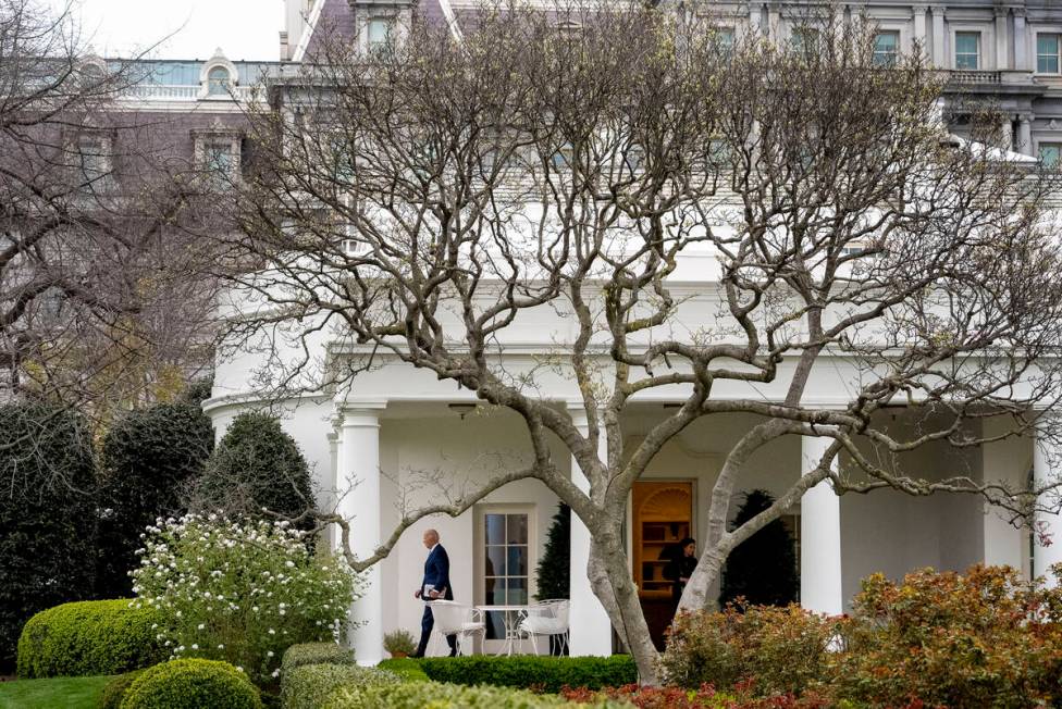 President Joe Biden walks out of the Oval Office to board Marine One on the South Lawn of the W ...