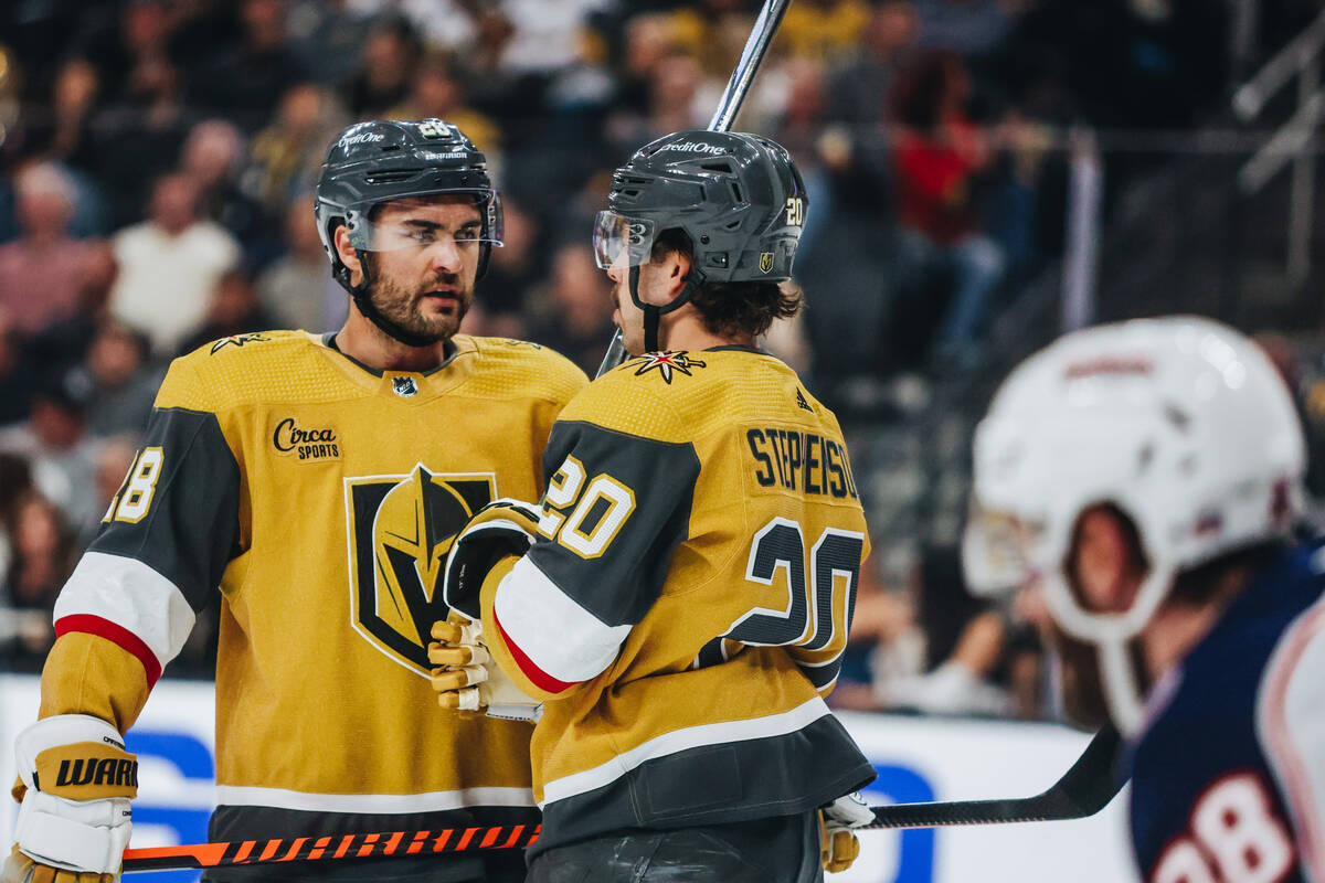 Golden Knights center Chandler Stephenson (20) and Golden Knights left wing William Carrier (28 ...