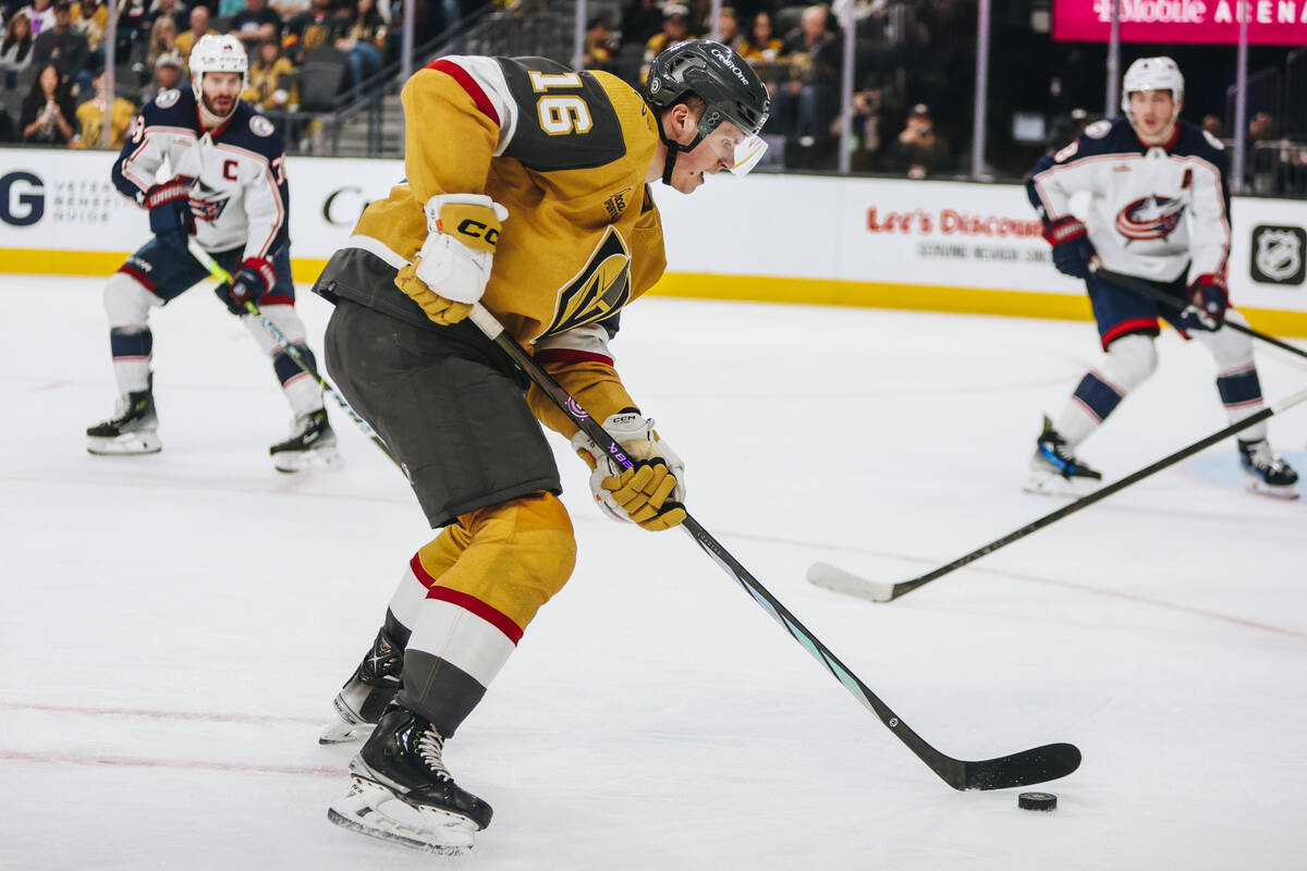 Golden Knights left wing Pavel Dorofeyev (16) shuffles the puck during an NHL hockey game betwe ...