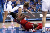 UNLV Lady Rebels center Desi-Rae Young (23) fights for the ball against Creighton Bluejays forw ...