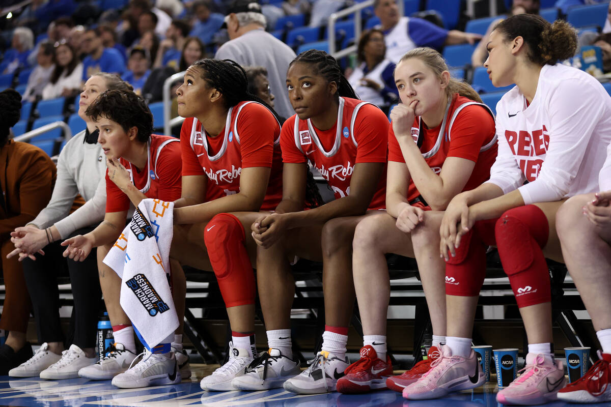 The UNLV Lady Rebels bench reacts as the Creighton Bluejays are winning during the second half ...