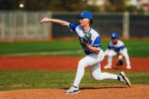 Basic pitcher Lincoln Evans (21) pitches the ball during a baseball game between Palo Verde and ...