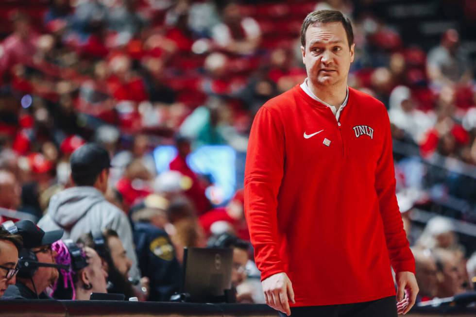UNLV head coach Kevin Kruger looks to a member of his coaching staff during a second-round NIT ...