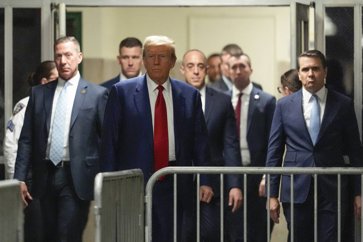 Former President Donald Trump arrives at Manhattan criminal court to attend a pre-trial hearing ...