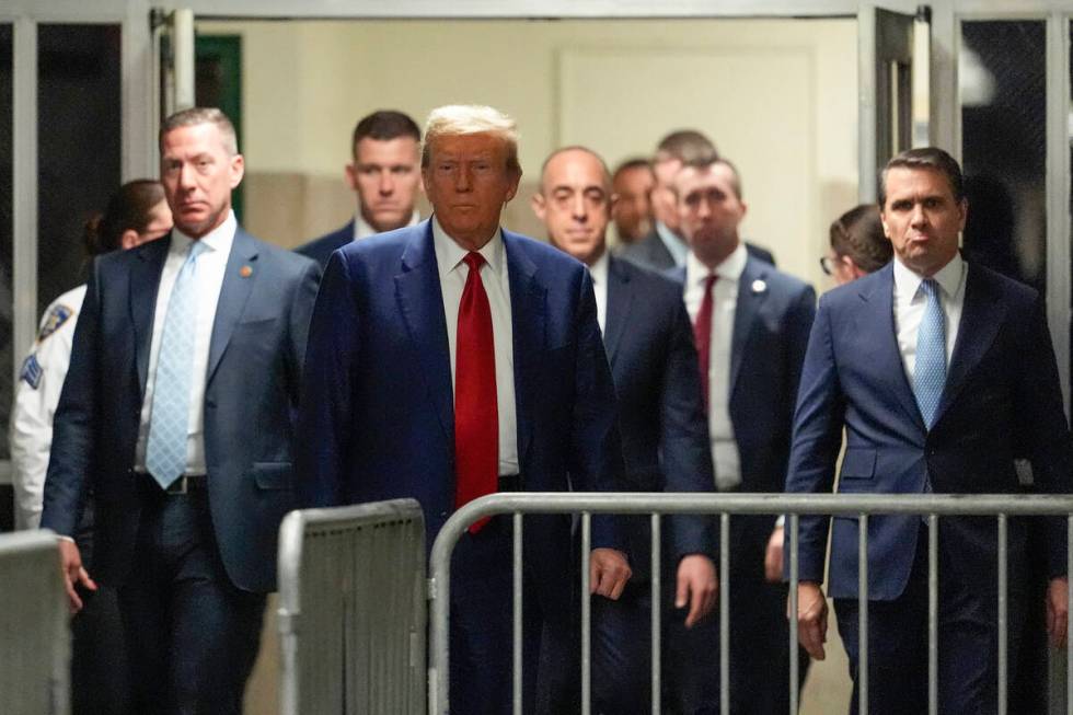 Former President Donald Trump arrives at Manhattan criminal court to attend a pre-trial hearing ...