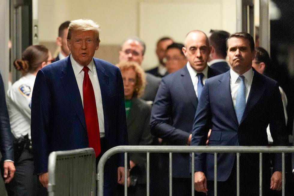 Former President Donald Trump departs Trump Tower to attend a pre-trial hearing in Manhattan cr ...