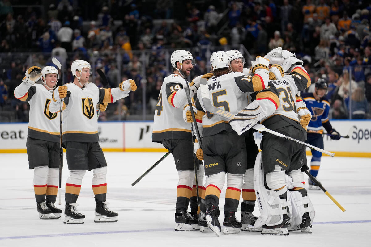 Members of Vegas Golden Knights celebrate as overtime victory over the St. Louis Blues followin ...