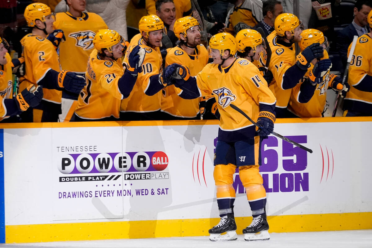 Nashville Predators center Gustav Nyquist (14) celebrates his goal with teammates during the th ...