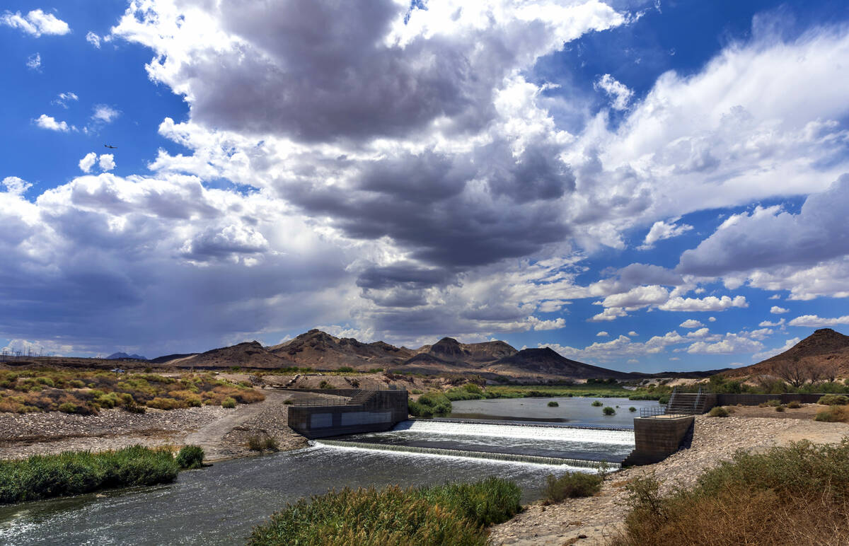 A rainstorm builds about the Rainbow Gardens Weir along the Las Vegas Wash on Thursday, Aug. 17 ...
