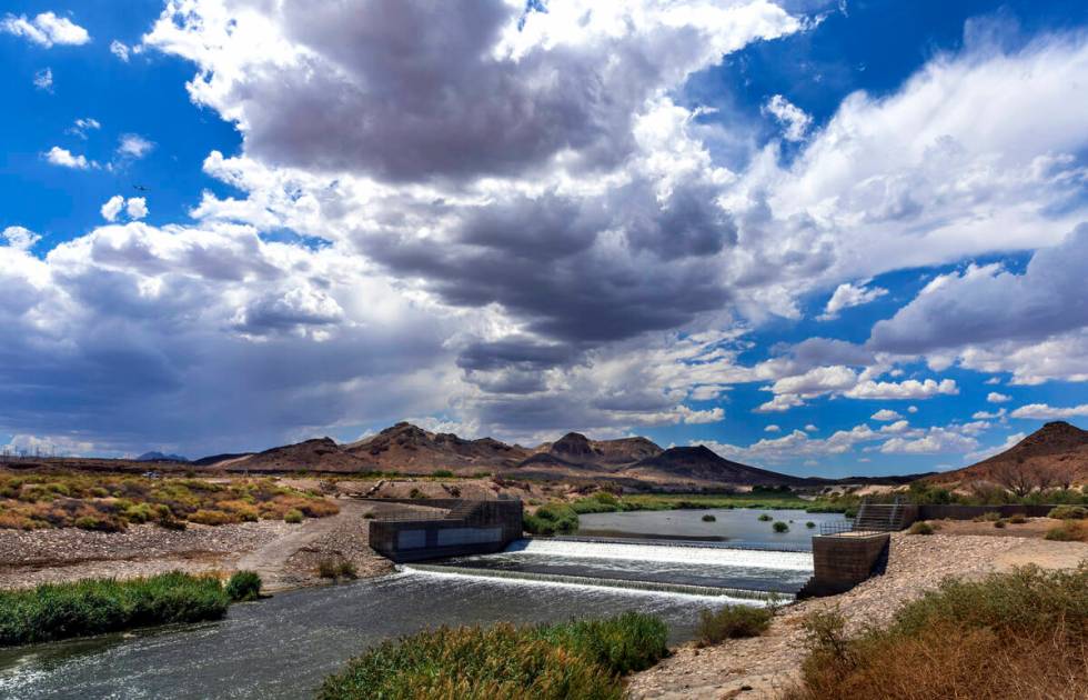 A rainstorm builds about the Rainbow Gardens Weir along the Las Vegas Wash on Thursday, Aug. 17 ...