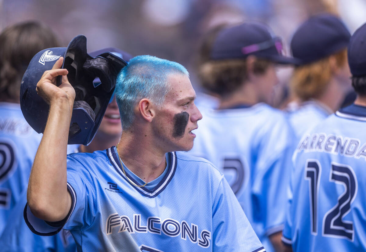 Foothill batter Landon Angelo shows off his dyed hair following a go-ahead run against Shadow R ...