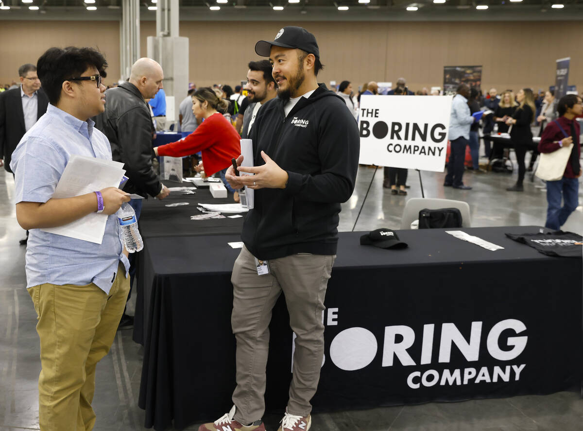 Darrell Lampa, right, a recruiter at the Boring Company, an infrastructure, tunnel construction ...