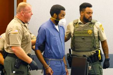 Deobra Redden, who was captured on video attacking a Las Vegas judge in January, is led into a ...