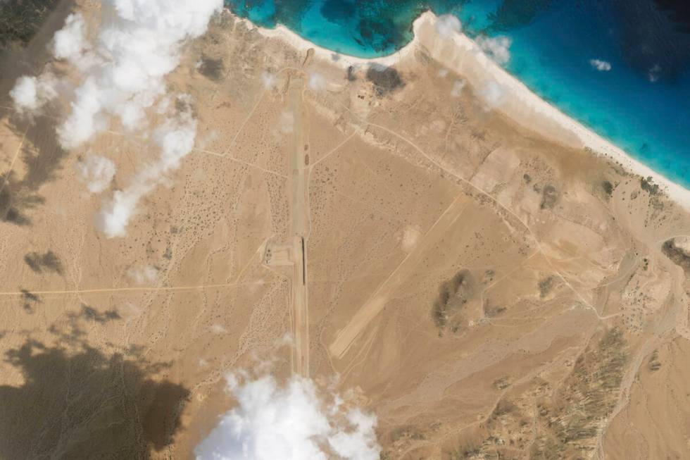 This satellite photo captured by Planet Labs PBC shows the construction of an airstrip on Abd a ...