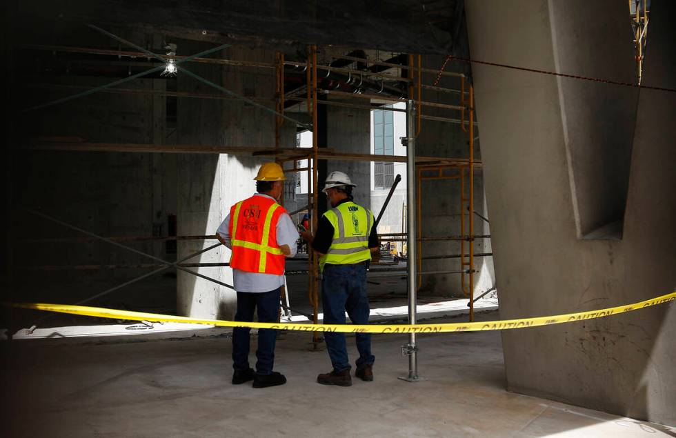 Workers are seen on the ground floor during the demolition of the Harmon Hotel at City Center i ...