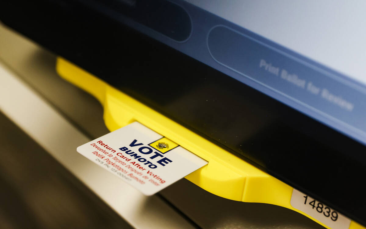 A voting machine with a vote card at the Clark County Election Department in North Las Vegas, T ...