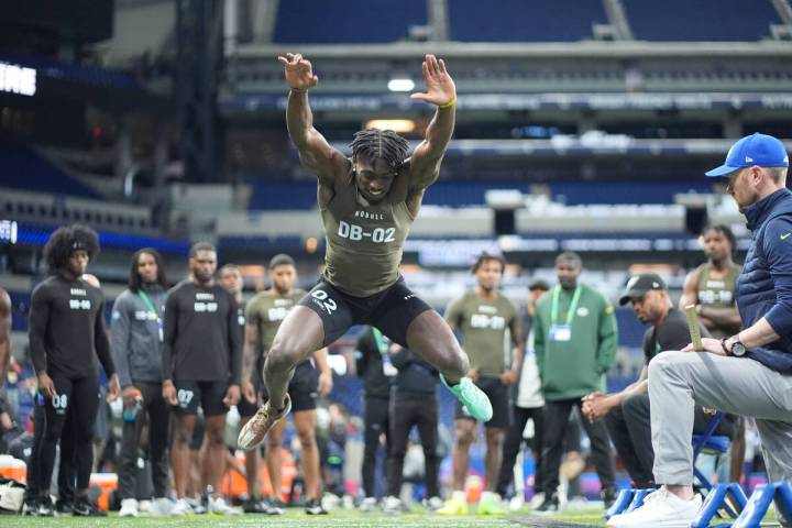 Alabama defensive back Terrion Arnold runs a drill at the NFL football scouting combine, Friday ...