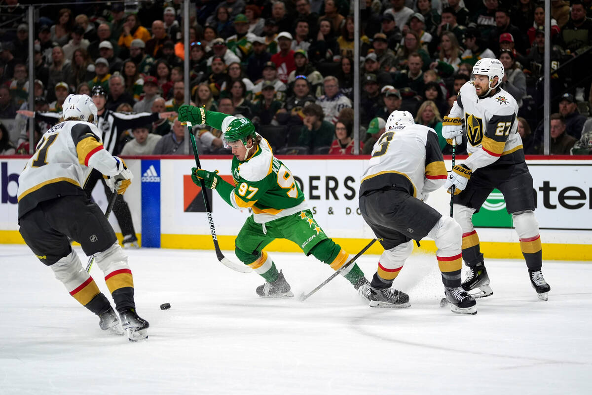 Minnesota Wild left wing Kirill Kaprizov (97) controls the puck as Vegas Golden Knights center ...