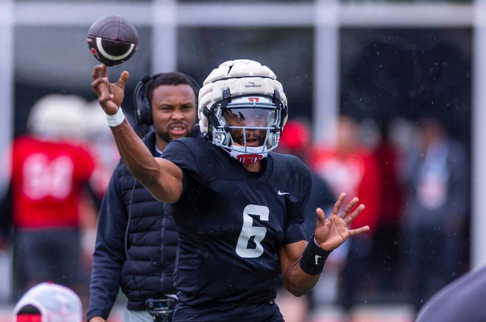 UNLV quarterback Hajj-Malik Williams (6) releases a pass to a receiver during spring football p ...