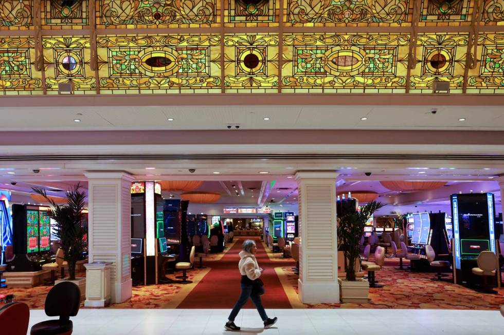 Nancy Kirk of Saratoga, Calif. walks under the famous stained-glass ceiling on the final day of ...