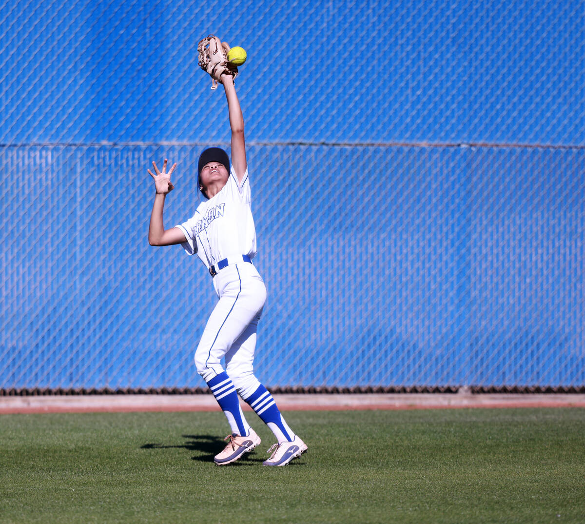 Bishop Gorman outfielder Brooklyn Hicks (1) bobbles the ball against Green Valley in the second ...