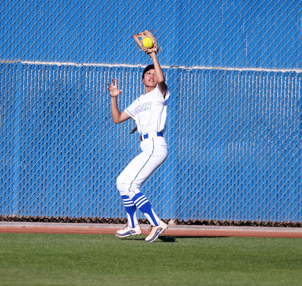 Bishop Gorman outfielder Brooklyn Hicks (1) brings in the ball against Green Valley in the sixt ...