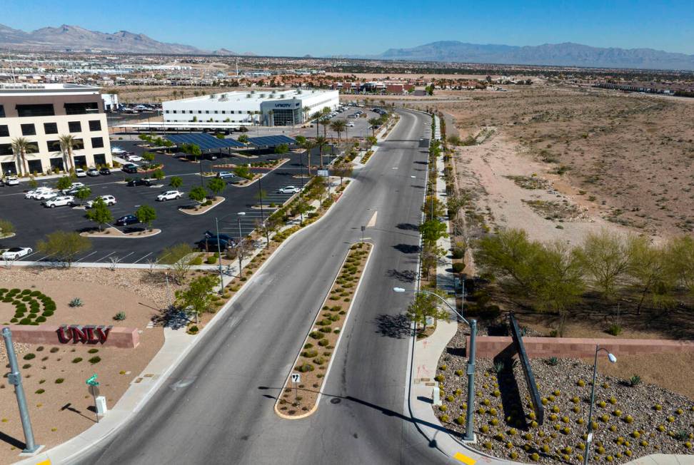 UNLV Black Fire Innovation, the first flagship tech building, left, and UNICITY Nevada building ...