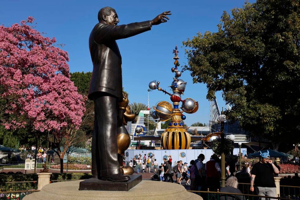 The “Partners” statue of Walt Disney and Mickey Mouse stands near the center of D ...