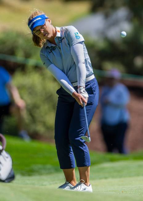 Brooke Henderson chips the ball on the green at hole #9 during the second day of the LPGA T-Mob ...