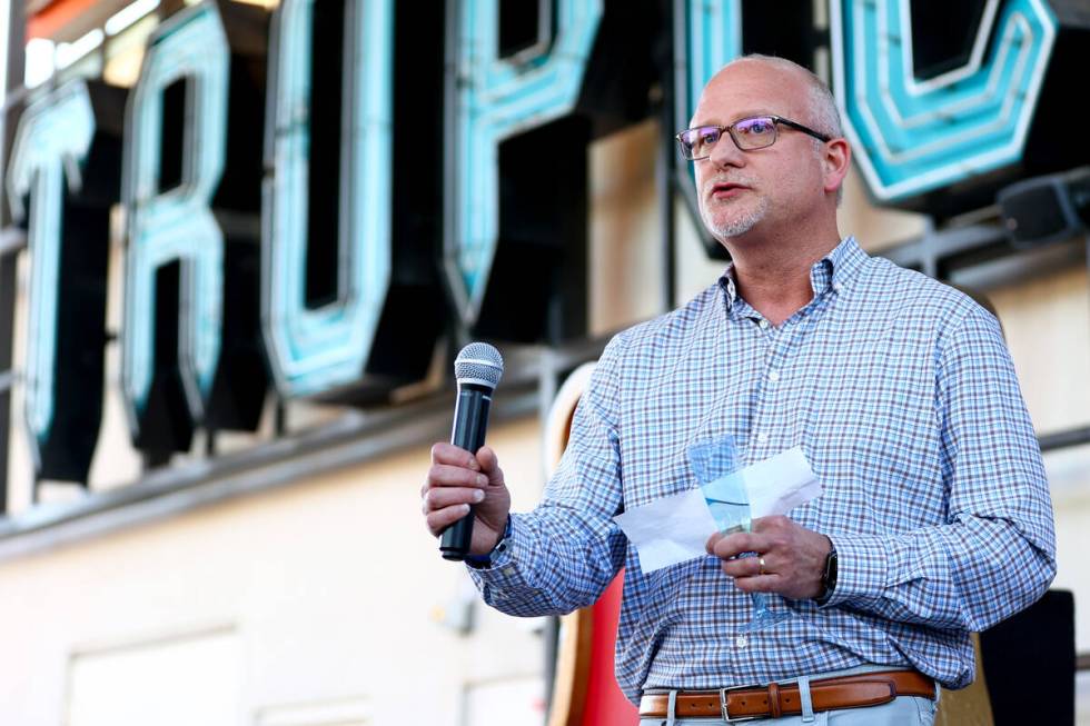 Arik Knowles, vice president of hotel operations at Tropicana, speaks before a sign from the no ...