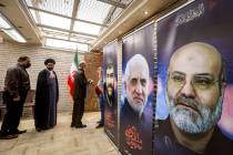 Posters depicting victims of an air strike on the consular annex of the Iranian embassy's headq ...