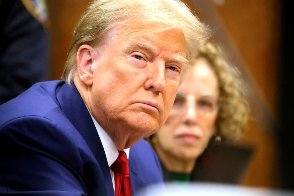 Former U.S. President Donald Trump appears with his lawyer Susan Necheles for a pre-trial heari ...