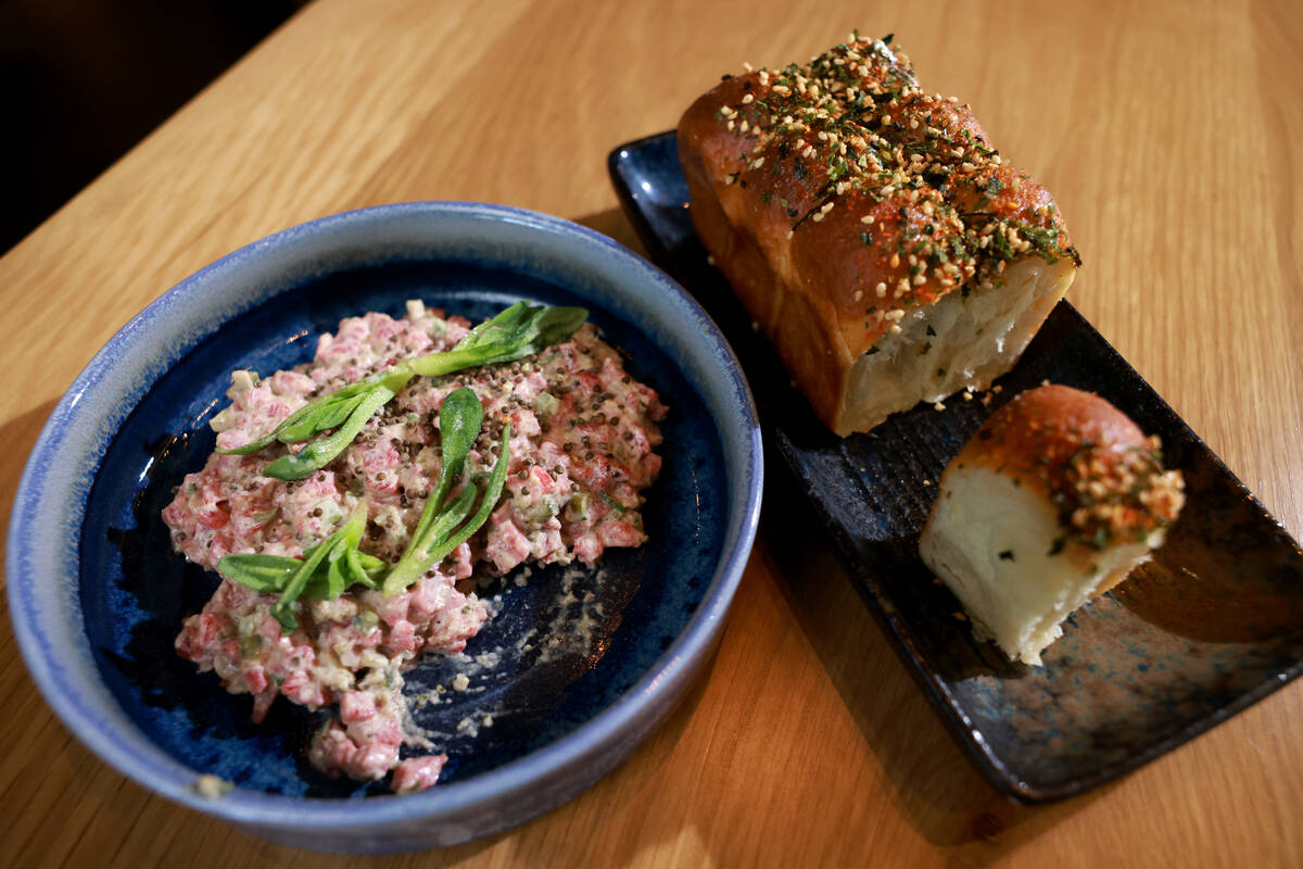 Wagyu bone marrow tartare is served with Japanese milk bread at KYU, an American barbecue resta ...