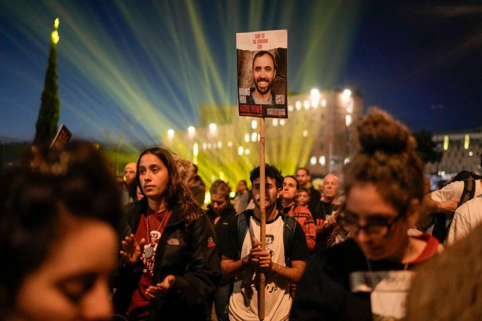 Israeli demonstrators call on the government to secure the release of hostages held in the Gaza ...