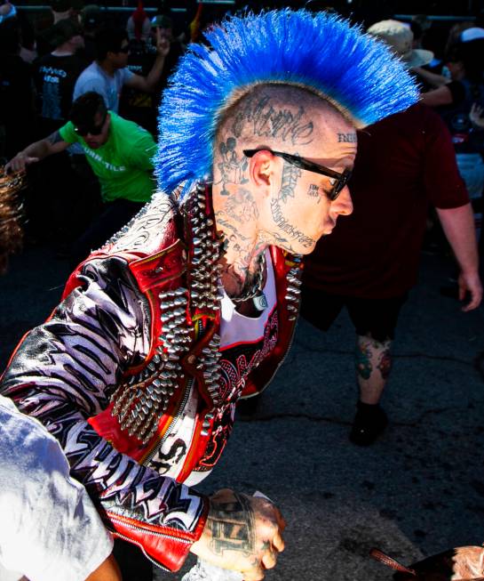 Attendees mosh in a circle pit during the Punk Rock Bowling music festival on Saturday, May 27, ...