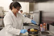Senior scientist Lisa Humphrey cooks up a batch Hamburger Helper inside of a test kitchen at Ea ...